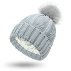 Winter Knitted Beanie Hat for Women – Stretchy Lined Skull Cap with Faux Fur Pom Pom