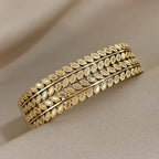 Bohemian Leaf Wide-Opening Stainless Steel Bracelet – Light Luxury Electroplated Cuff for Women